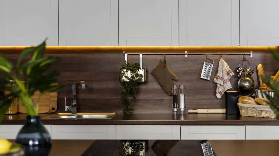 Wooden kitchen with a table decorated with flowers